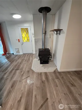 a view of a livingroom with wooden floor