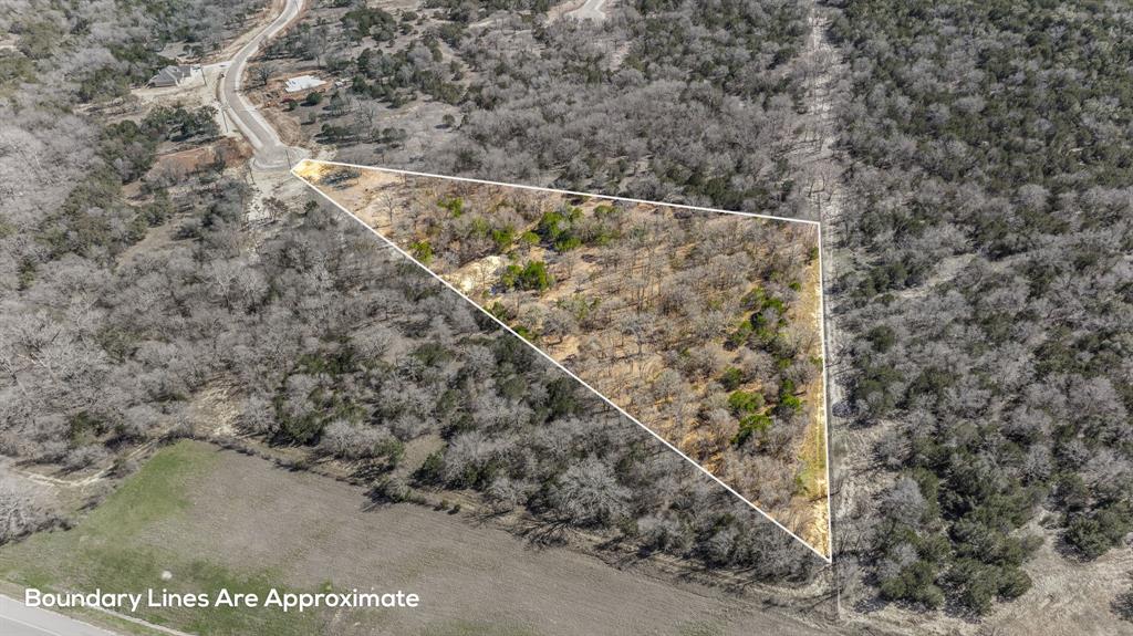 1051 Rose Court Nemo, TX 76070 - Photo 34 of 39 a view of a dry yard with wooden fence