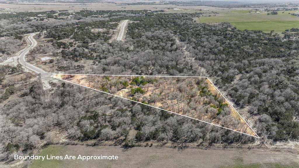 1051 Rose Court Nemo, TX 76070 - Photo 37 of 39 a view of a yard with wooden fence