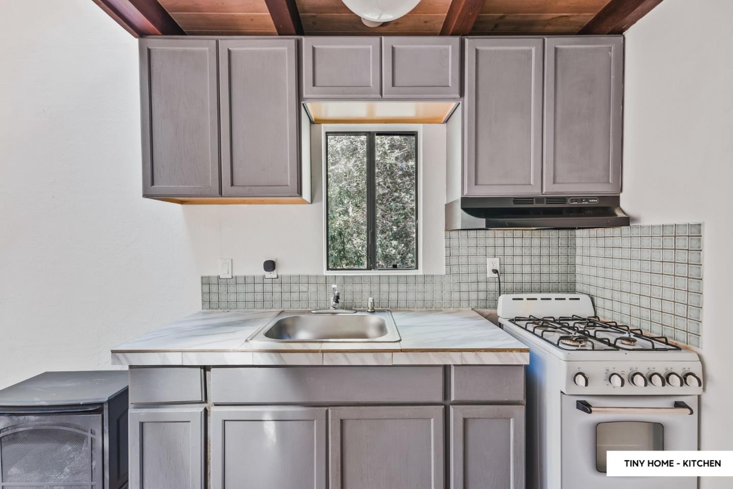 482 Riverview Drive Boulder Creek, CA 95006 - Photo 12 of 27 a kitchen with stainless steel appliances a sink stove and cabinets