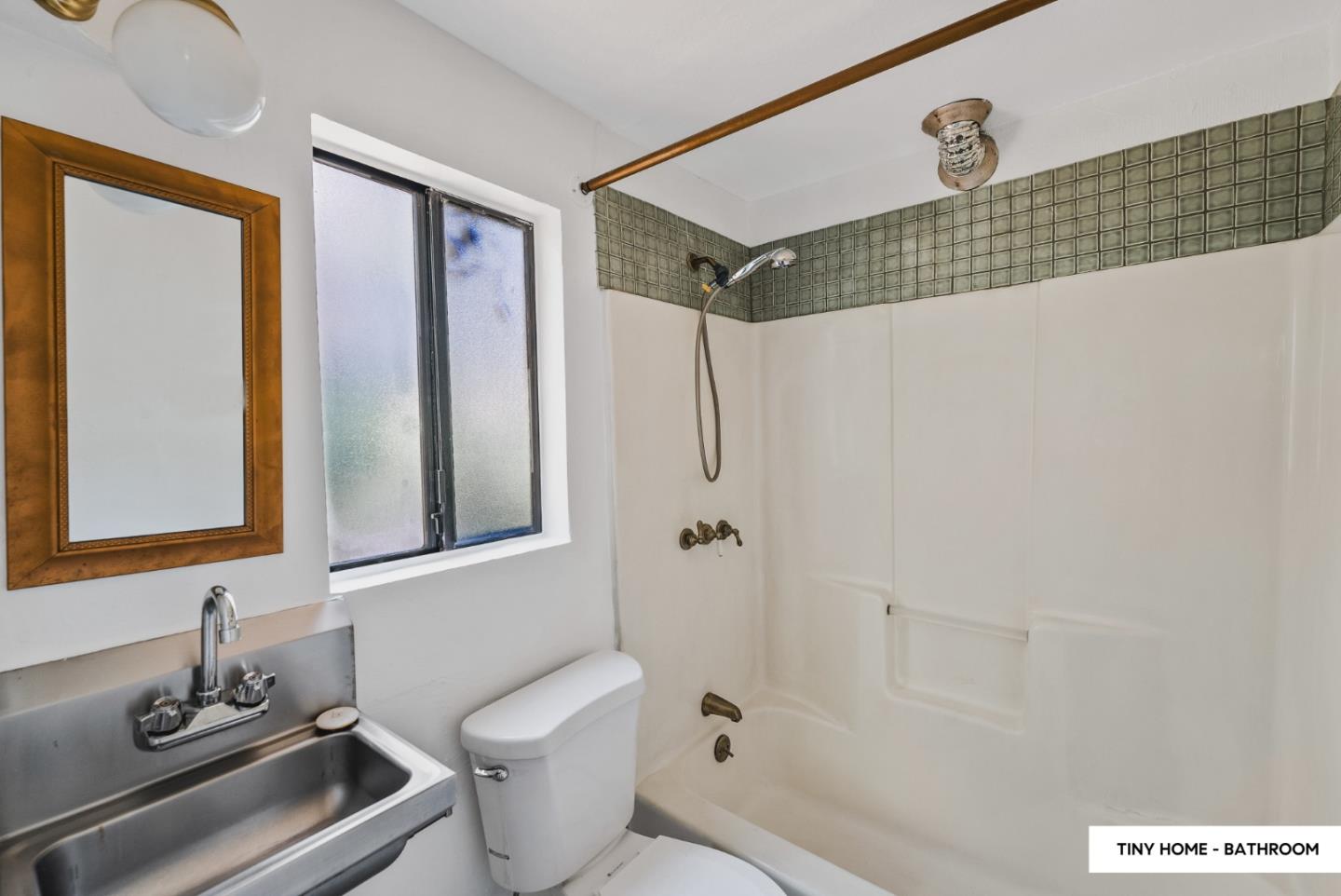 482 Riverview Drive Boulder Creek, CA 95006 - Photo 15 of 27 a bathroom with a toilet sink and shower