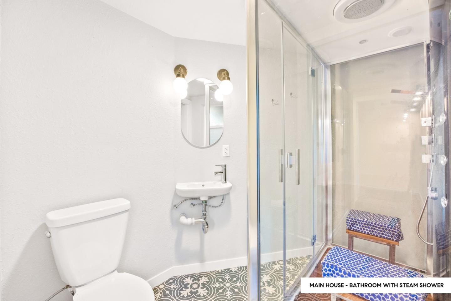 482 Riverview Drive Boulder Creek, CA 95006 - Photo 19 of 27 a bathroom with a toilet and a shower