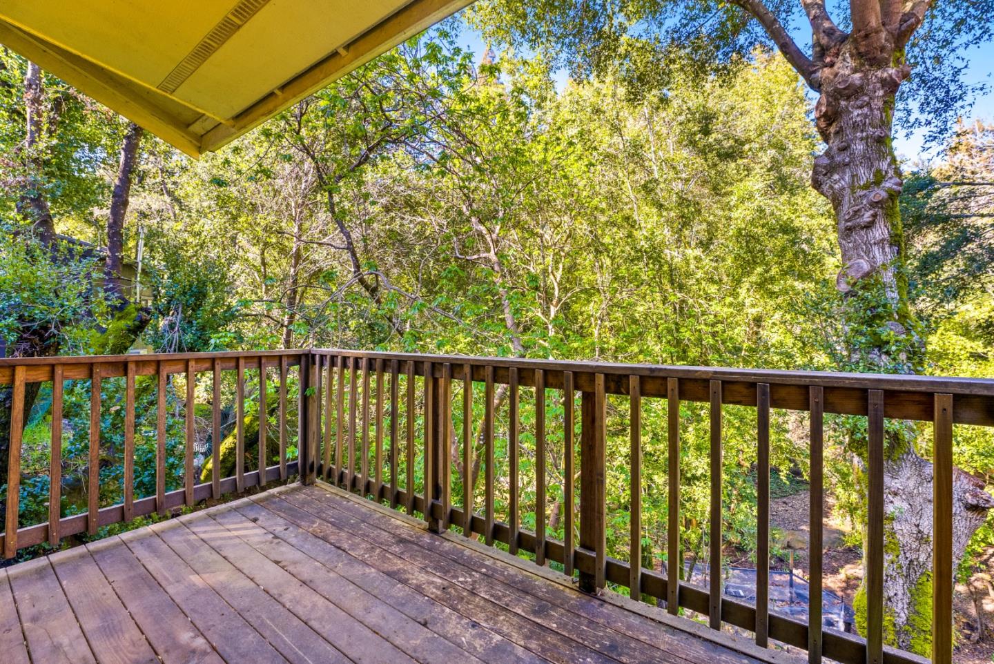 482 Riverview Drive Boulder Creek, CA 95006 - Photo 26 of 27 a balcony with wooden floor and fence