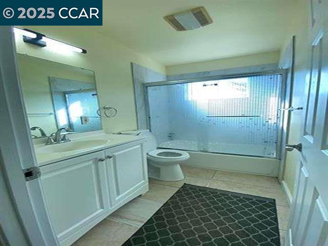 150 Rodeo Avenue Rodeo, CA 94572 - Photo 14 of 20 a bathroom with a double vanity sink toilet and shower