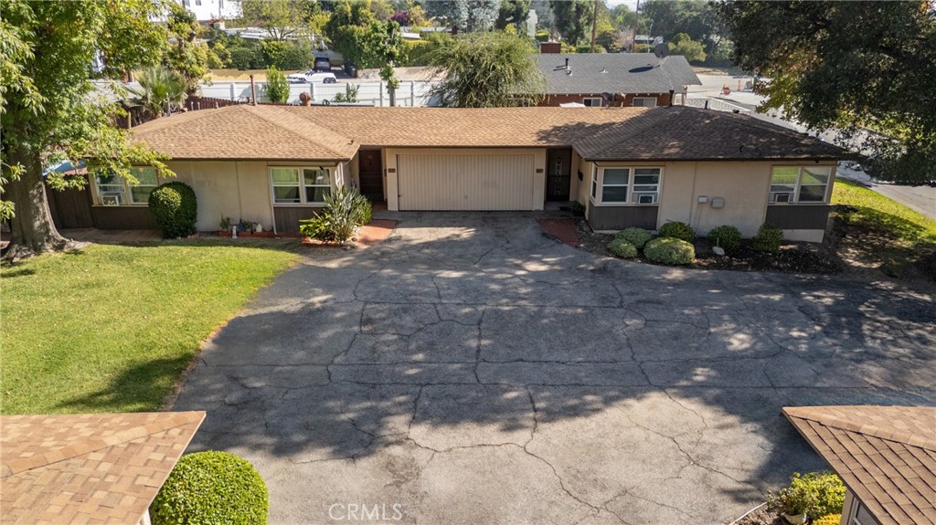 2815-2819 Sycamore Avenue La Crescenta, CA 91214 - Photo 6 of 15 a front view of a house with garden