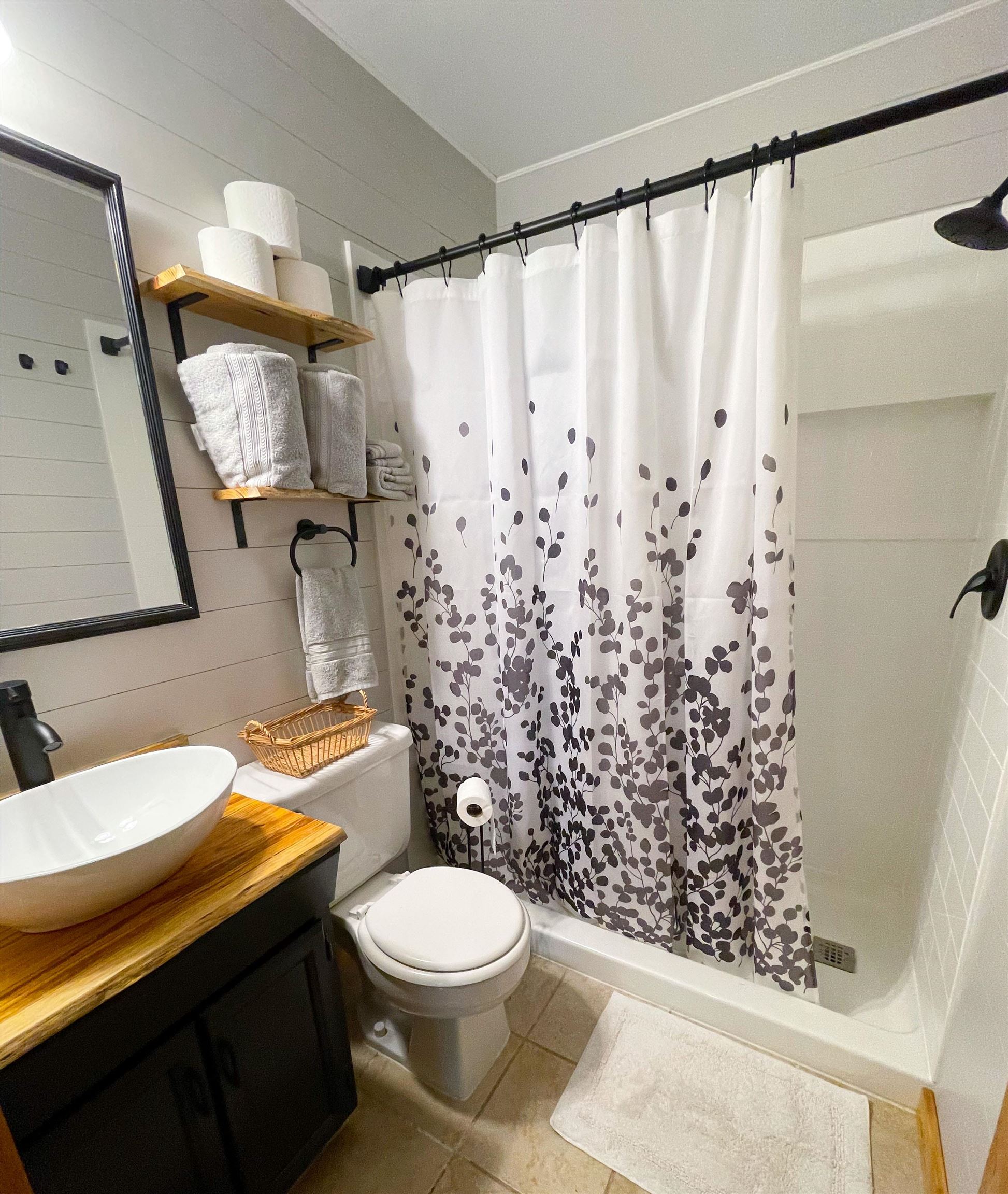9611 Deadfall Road Brighton, TN 38011 - Photo 16 of 25 a bathroom with a sink toilet and shower