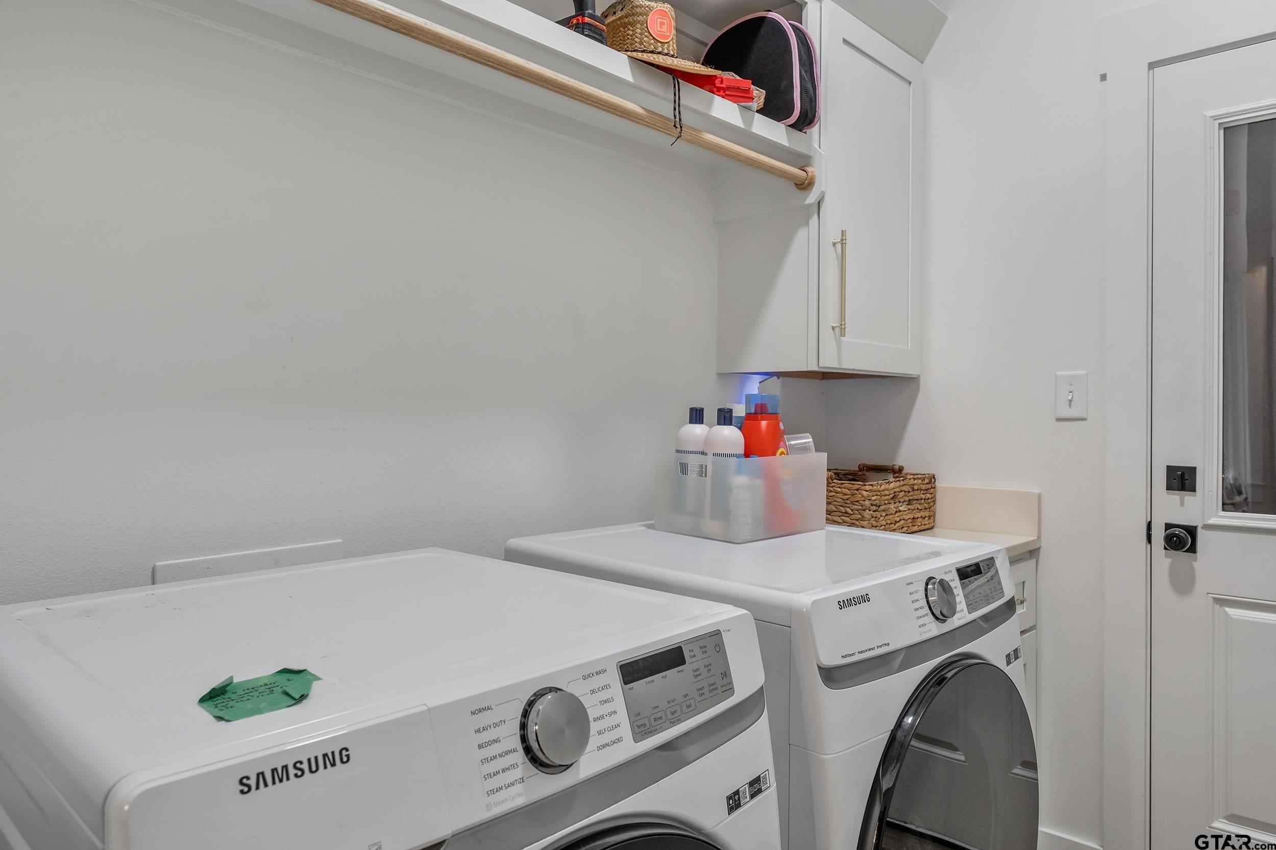 16837 Wilson Road Tyler, TX 75707 - Photo 34 of 44 a utility room with dryer and washer
