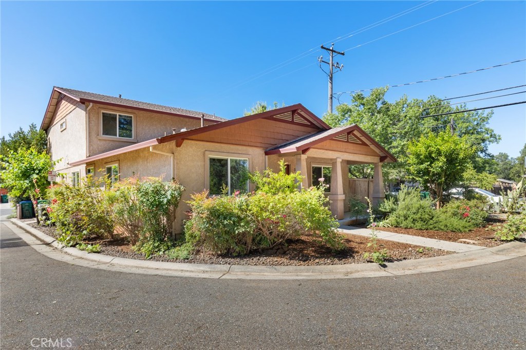 38 Kobe Loop Chico, CA 95973 - Photo 32 of 38 a front view of a house with a yard and potted plants