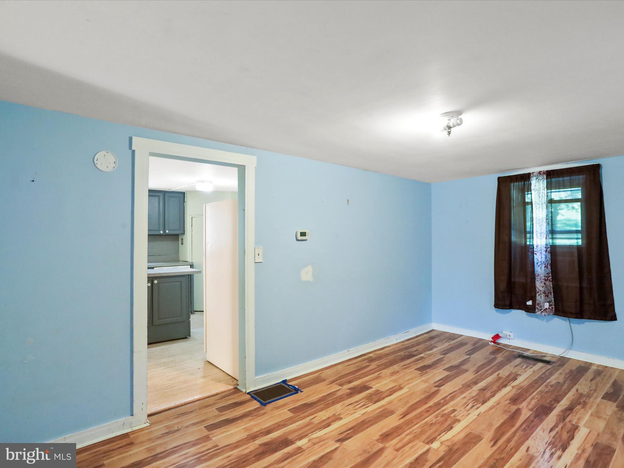 11856 Nicholson Road Keymar, MD 21757 - Photo 12 of 31 a view of a room with wooden floor and bathroom