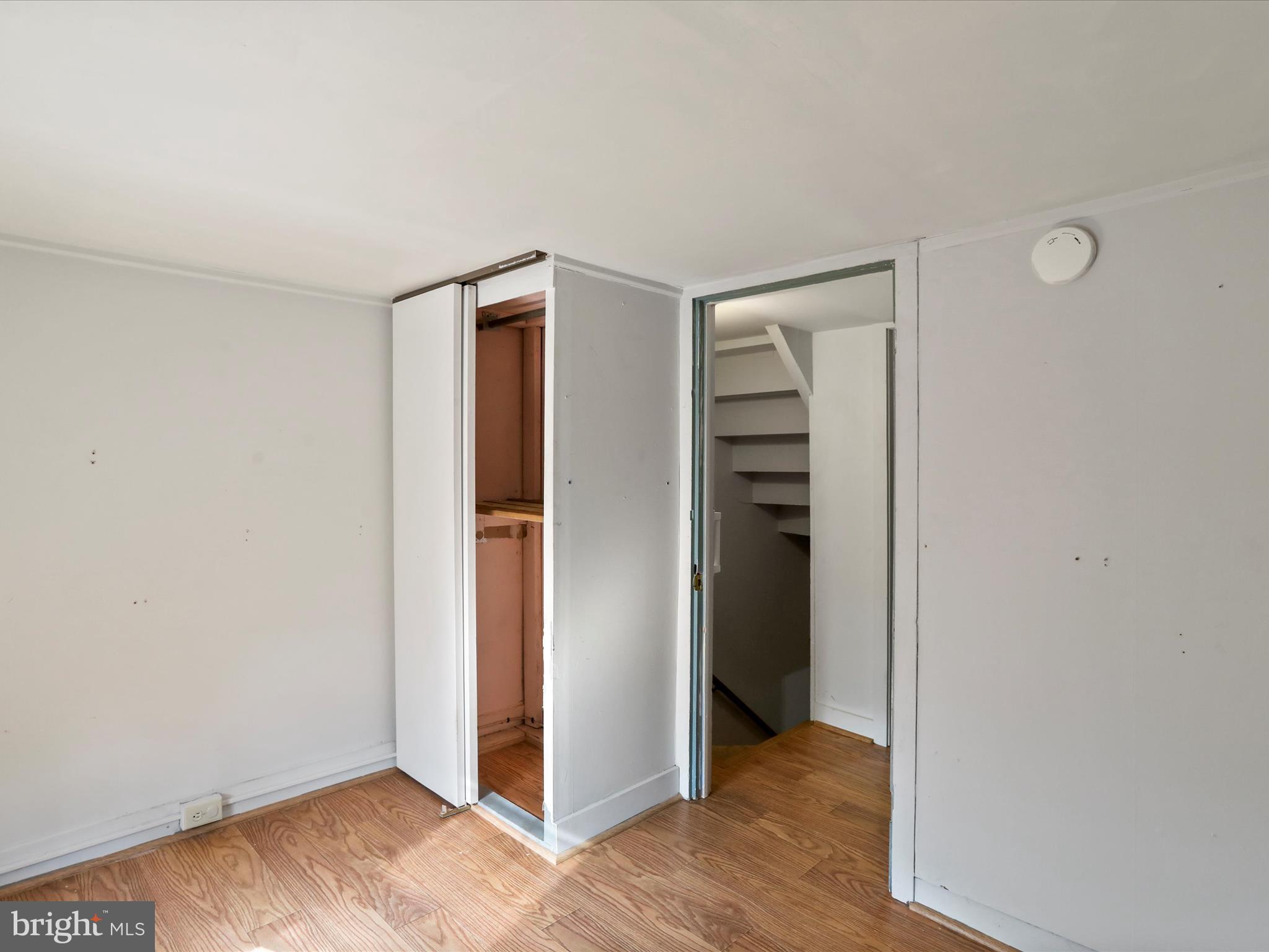 11856 Nicholson Road Keymar, MD 21757 - Photo 14 of 31 a view of an empty room with closet and wooden floor