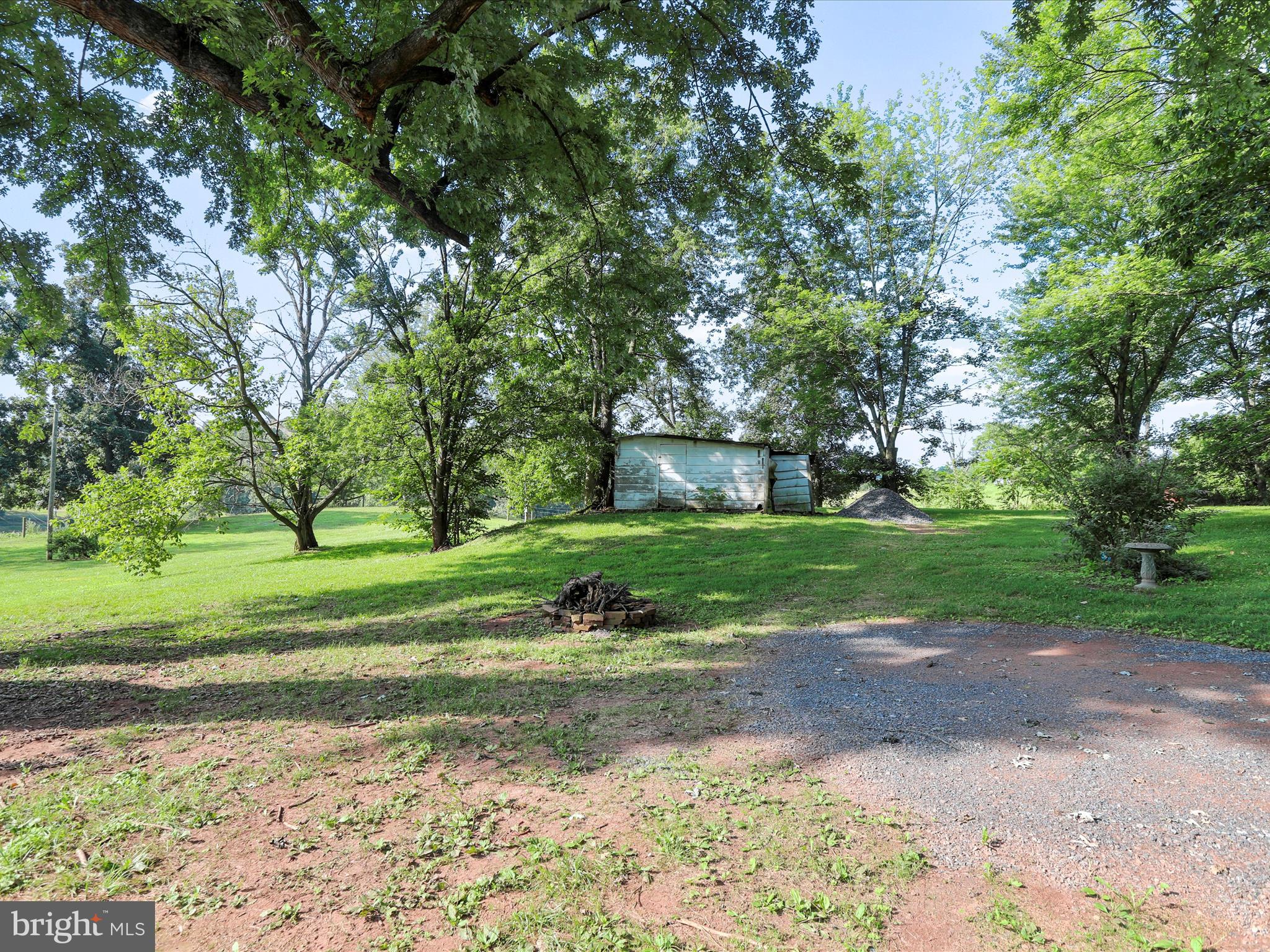 11856 Nicholson Road Keymar, MD 21757 - Photo 24 of 31 a view of a garden with large trees