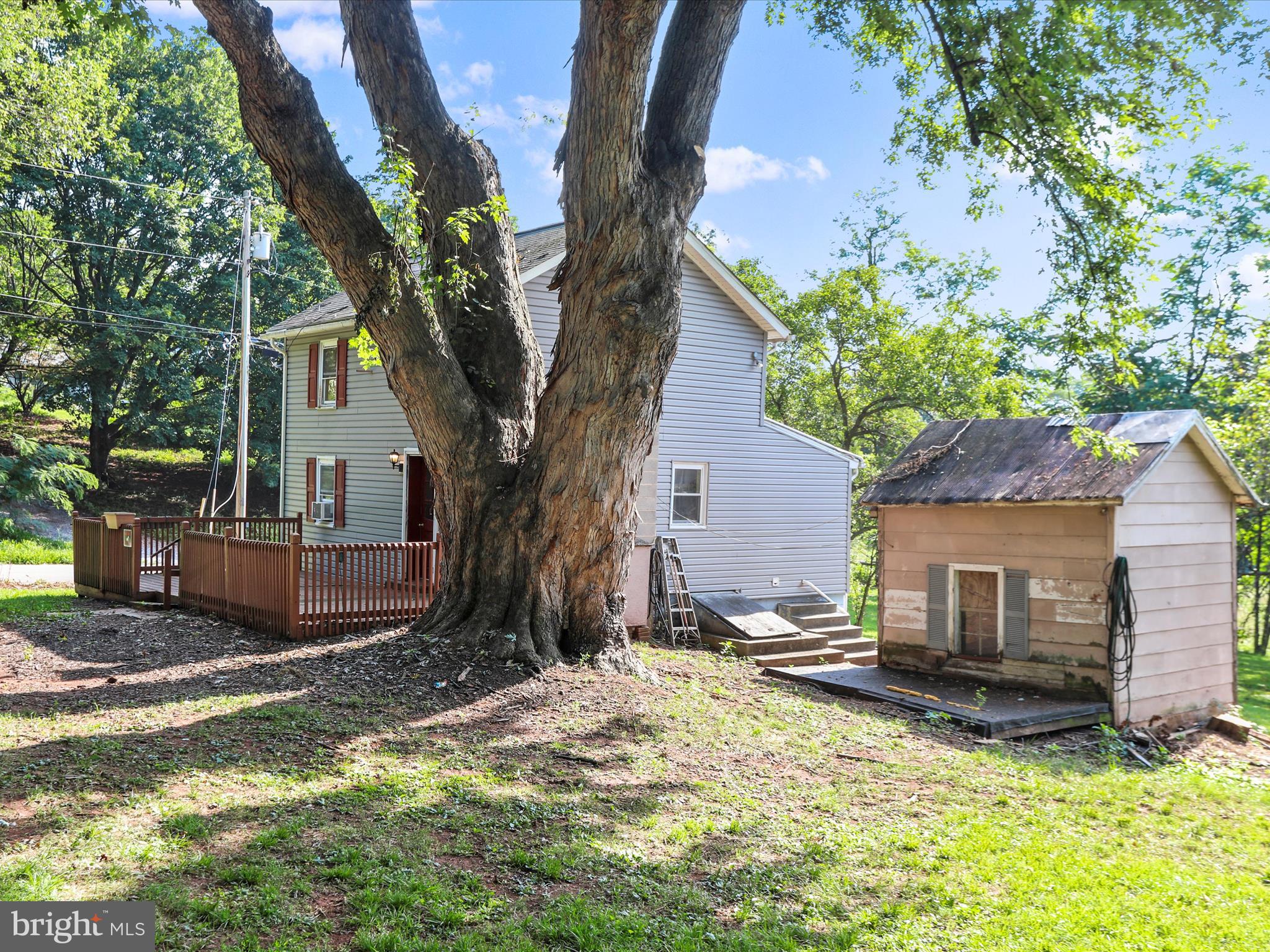 11856 Nicholson Road Keymar, MD 21757 - Photo 29 of 31 a view of a house with a tree in the yard