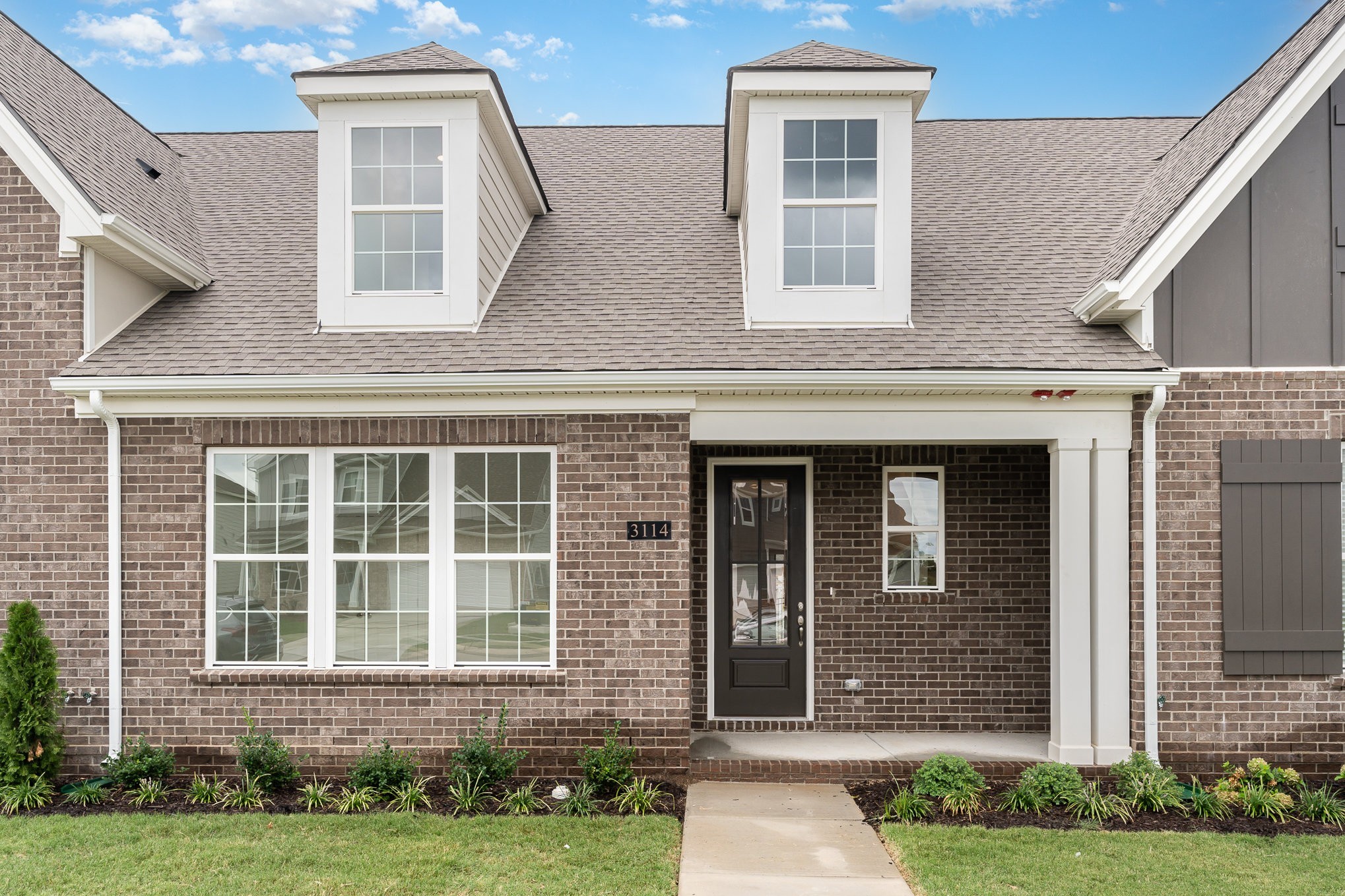 1073 Wrights Mill Road, Unit H7 Spring Hill, TN 37174 - Photo 1 of 43 a front view of a house with a yard