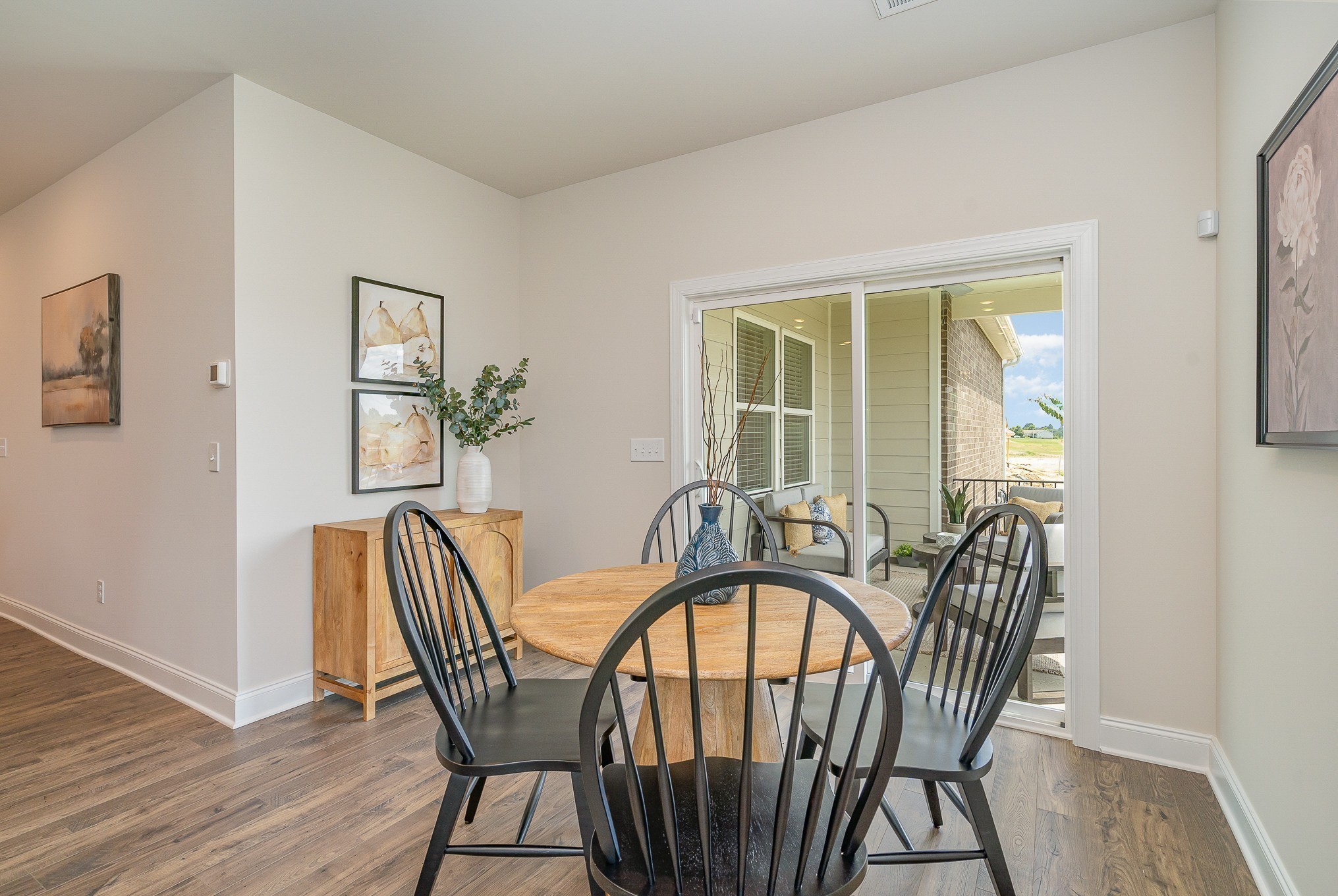 1073 Wrights Mill Road, Unit H7 Spring Hill, TN 37174 - Photo 8 of 43 a view of a dining room with furniture window and wooden floor