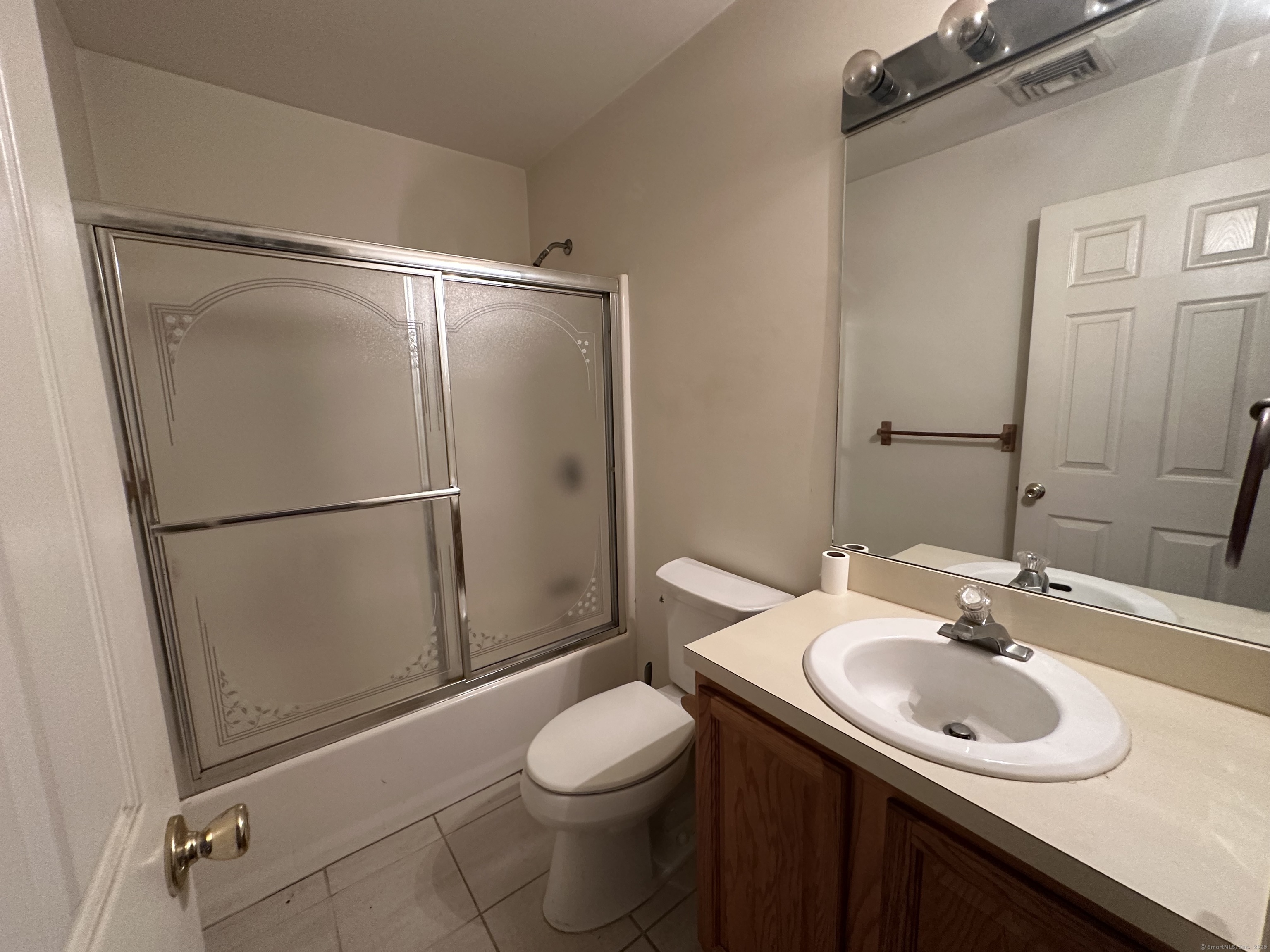7 Howard Avenue, Unit 3 Ansonia, CT 06401 - Photo 11 of 15 a bathroom with a sink toilet and shower