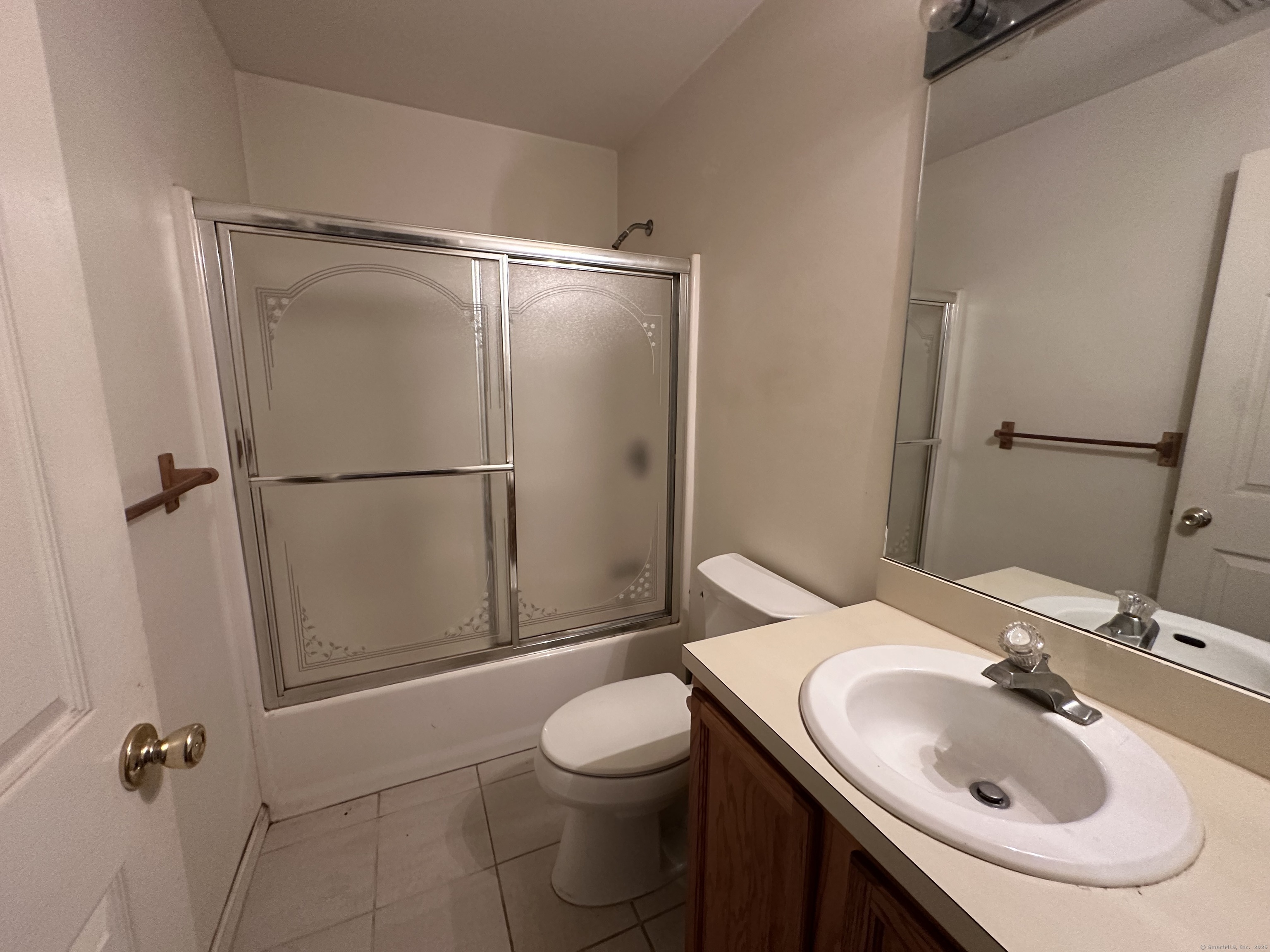 7 Howard Avenue, Unit 3 Ansonia, CT 06401 - Photo 12 of 15 a bathroom with a sink toilet and shower