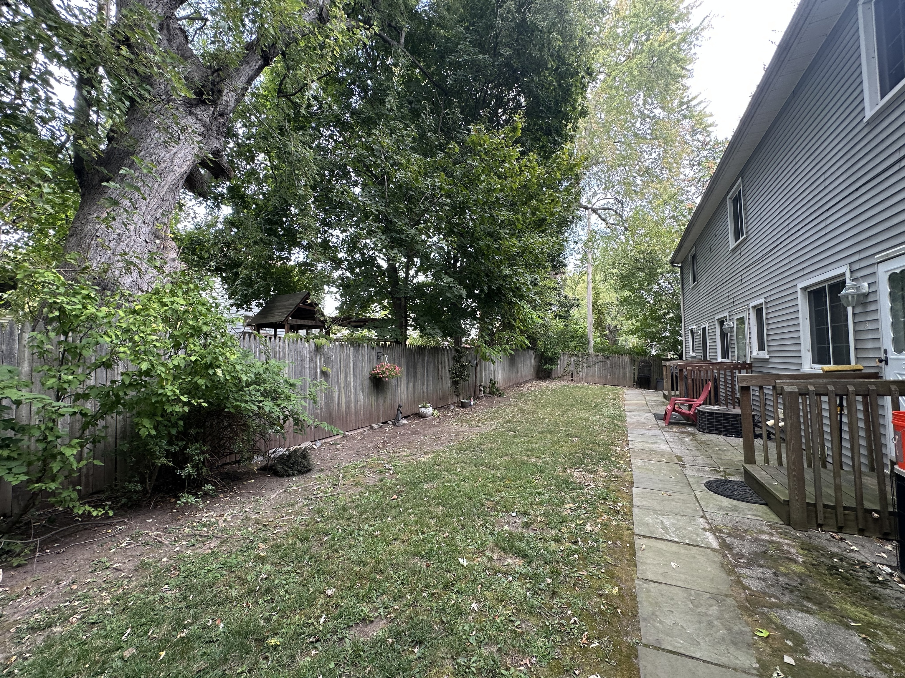 7 Howard Avenue, Unit 3 Ansonia, CT 06401 - Photo 2 of 15 a view of backyard of the house