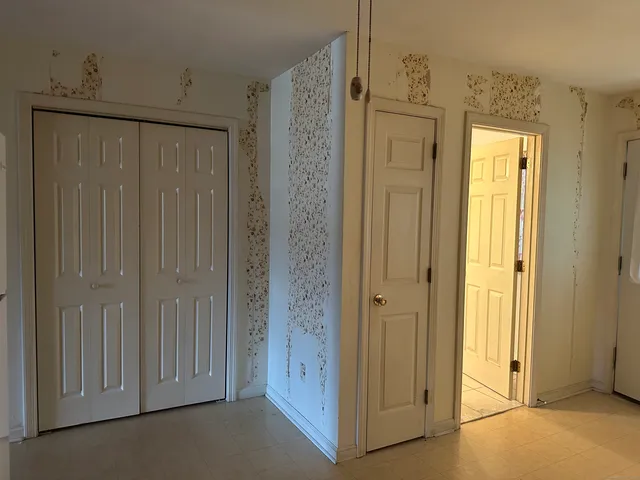 a bathroom with a shower and a tub
