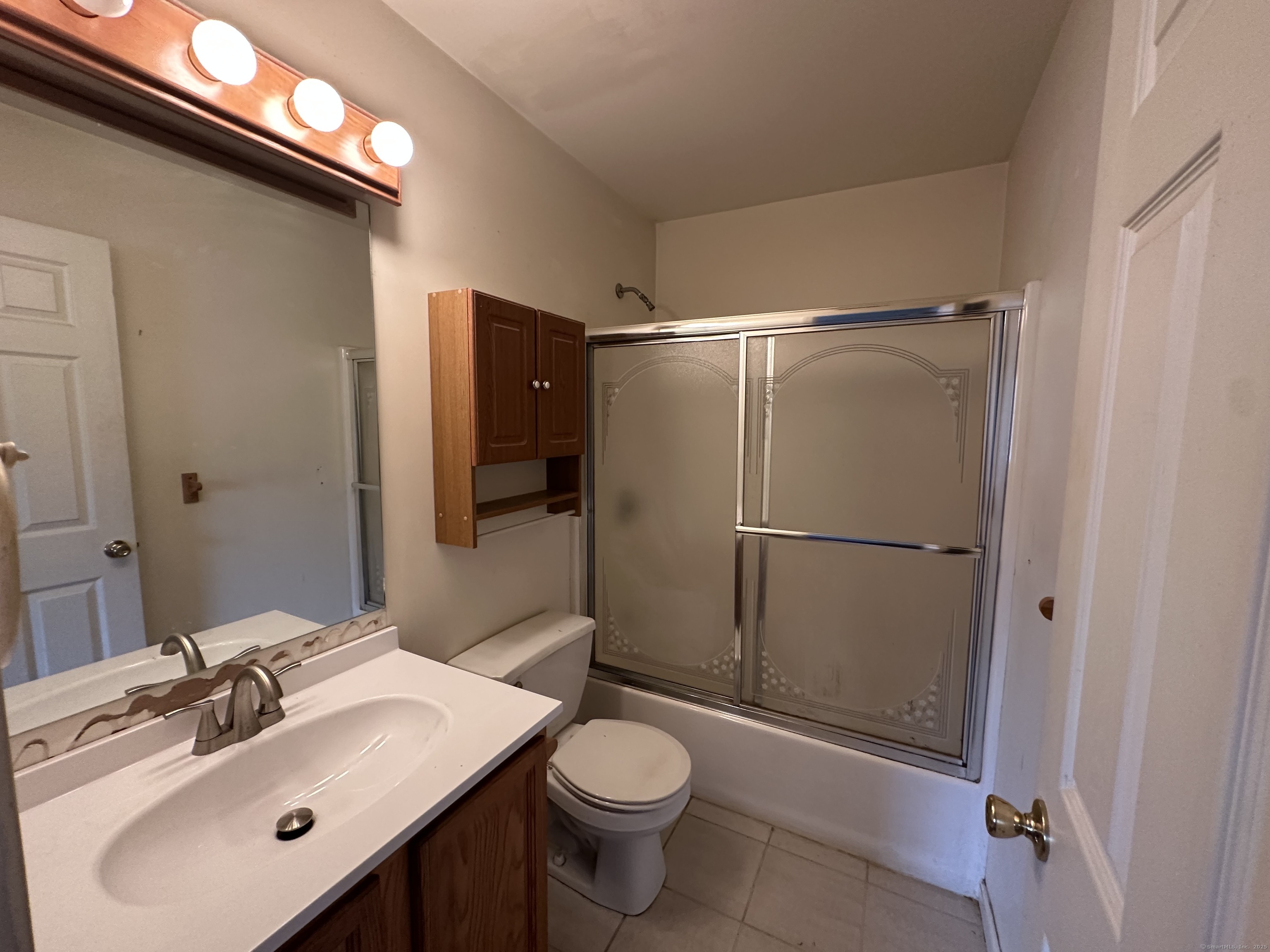 7 Howard Avenue, Unit 3 Ansonia, CT 06401 - Photo 10 of 15 a bathroom with a sink toilet and shower