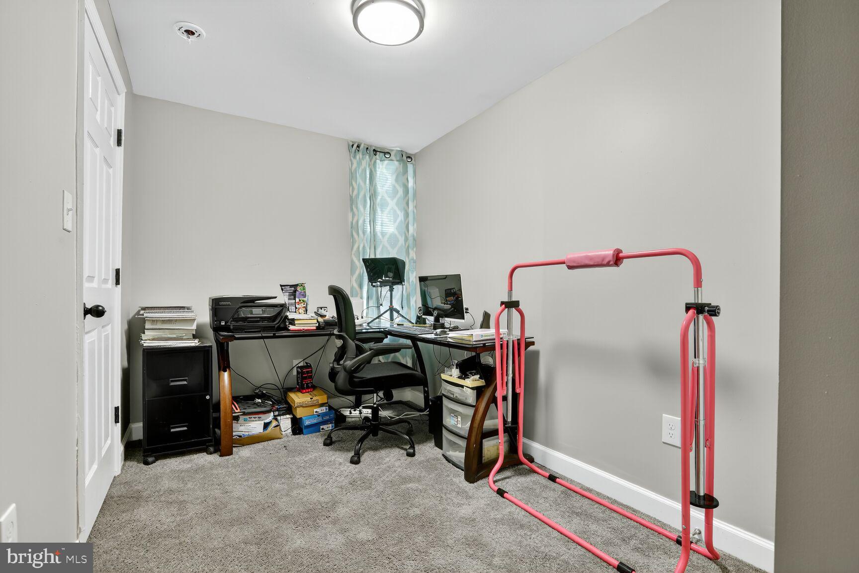 1502 East Hoffman Street Baltimore, MD 21213 - Photo 22 of 30 a view of a workspace with furniture