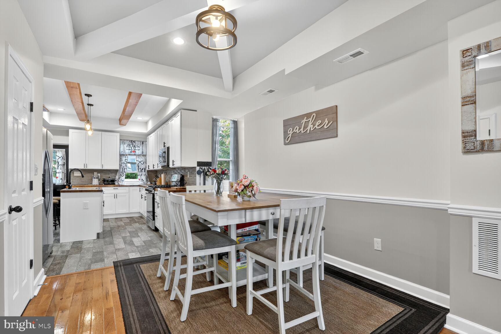 1502 East Hoffman Street Baltimore, MD 21213 - Photo 6 of 30 a view of a dining room with furniture