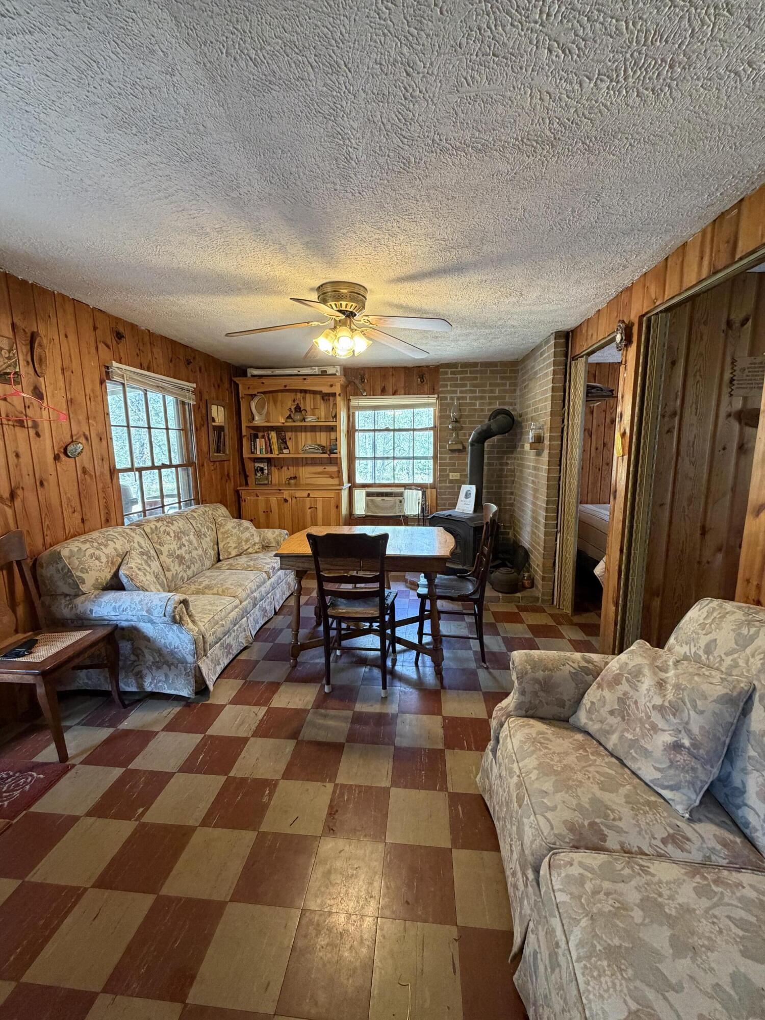 4066 Palmer Road Luzerne, MI 48636 - Photo 10 of 13 Looking into living and dining area