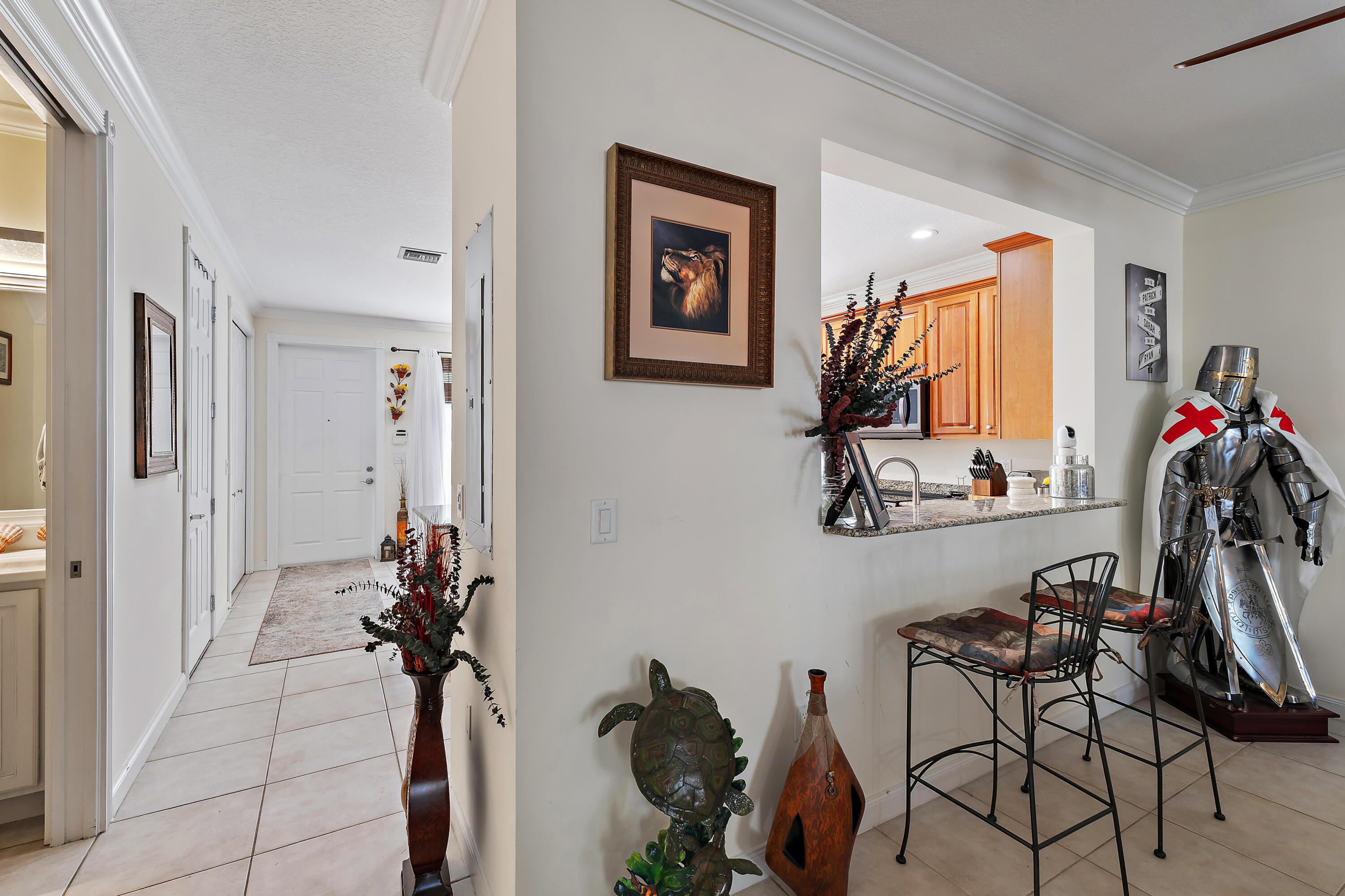 1302 Sunshine Drive Jupiter, FL 33458 - Photo 6 of 43 Kitchen Entry