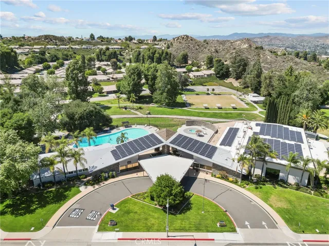 an aerial view of a house with a garden