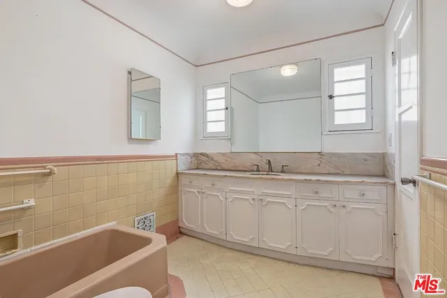 a front view of building with a yard