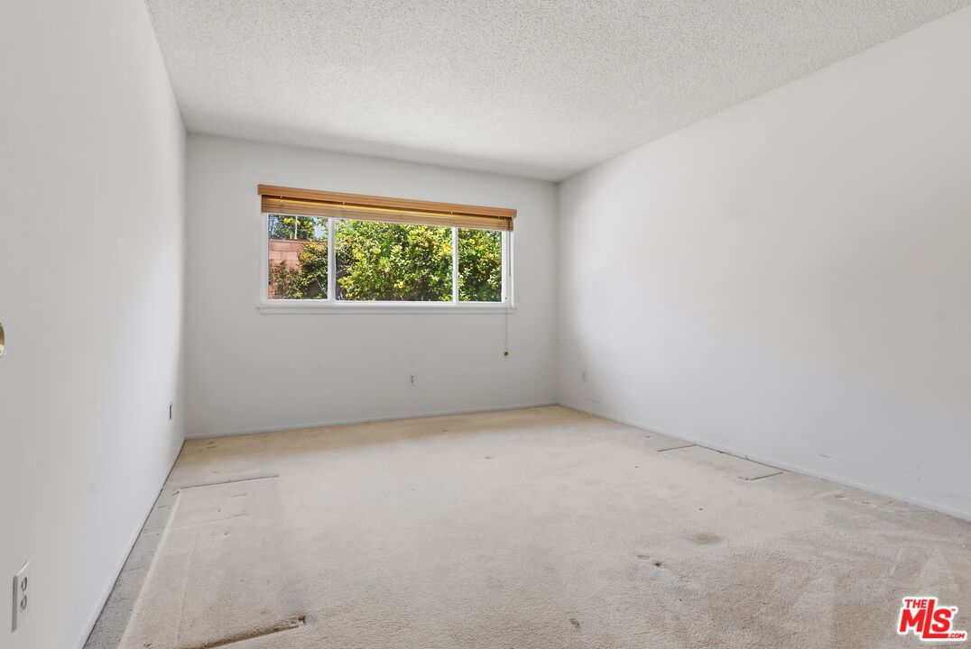 19131 Tulsa Street Porter Ranch, CA 91326 - Photo 21 of 43 an empty room with a window
