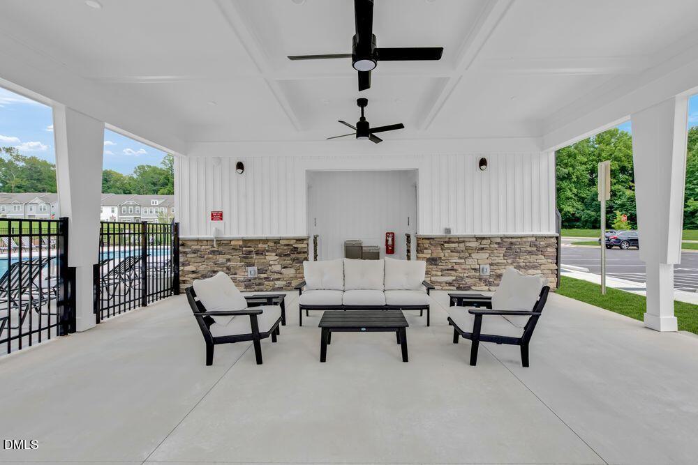 44 Charlie Circle Angier, NC 27501 - Photo 20 of 48 a living room with furniture and a gate