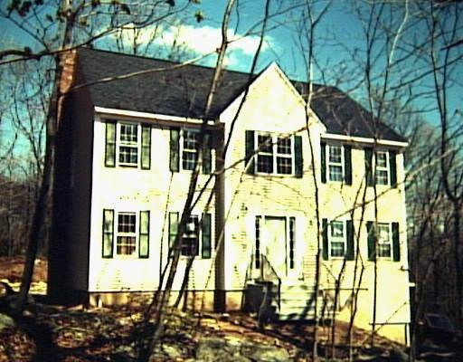 18 Great Ring Road Newtown, CT 06482 - Photo 1 of 1 a front view of a house with a yard