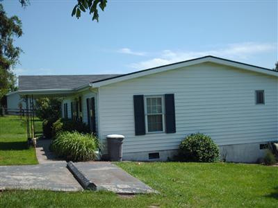 276 New Haven Road Lancaster, KY 40444 - Photo 3 of 23 Side view of house with the paved drivew