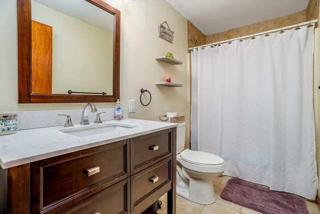 a utility room with a sink dryer and washer