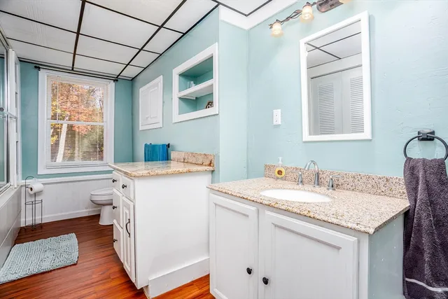 a front view of a house with a yard table and chairs