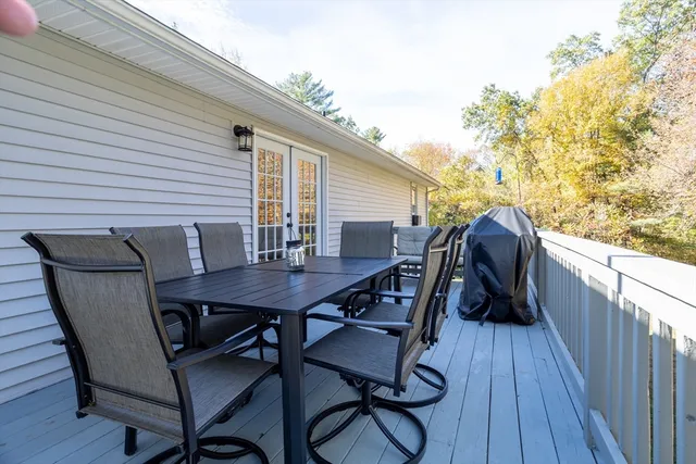 a view of balcony with furniture
