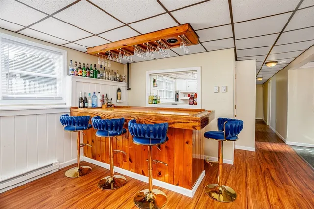 a room with furniture and a wooden floor