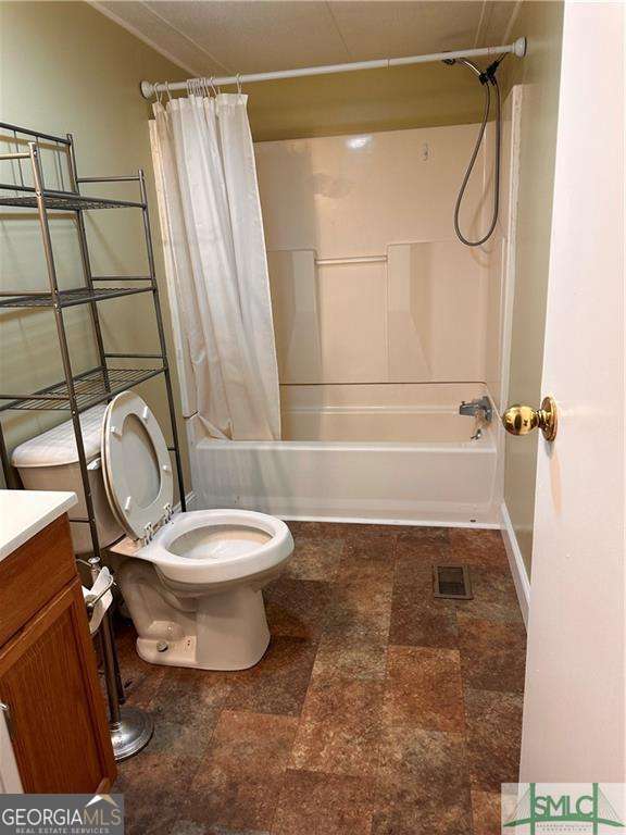 219 John Carter Road Bloomingdale, GA 31302 - Photo 11 of 28 a bathroom with a toilet and a shower