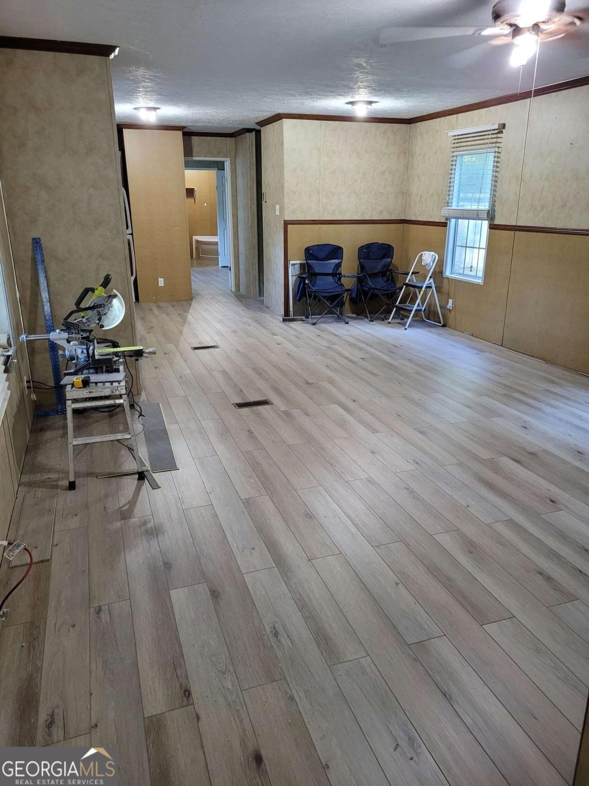 219 John Carter Road Bloomingdale, GA 31302 - Photo 16 of 28 a view of a livingroom with furniture and a fireplace