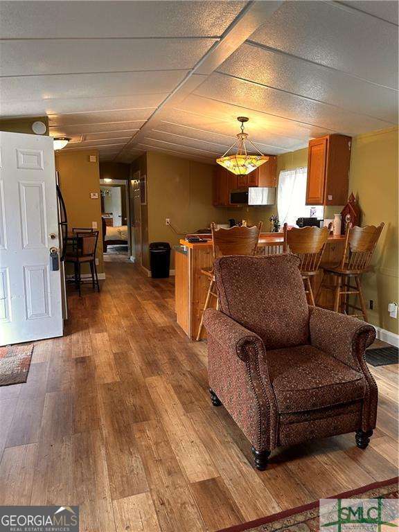219 John Carter Road Bloomingdale, GA 31302 - Photo 3 of 28 a living room with furniture and a chandelier