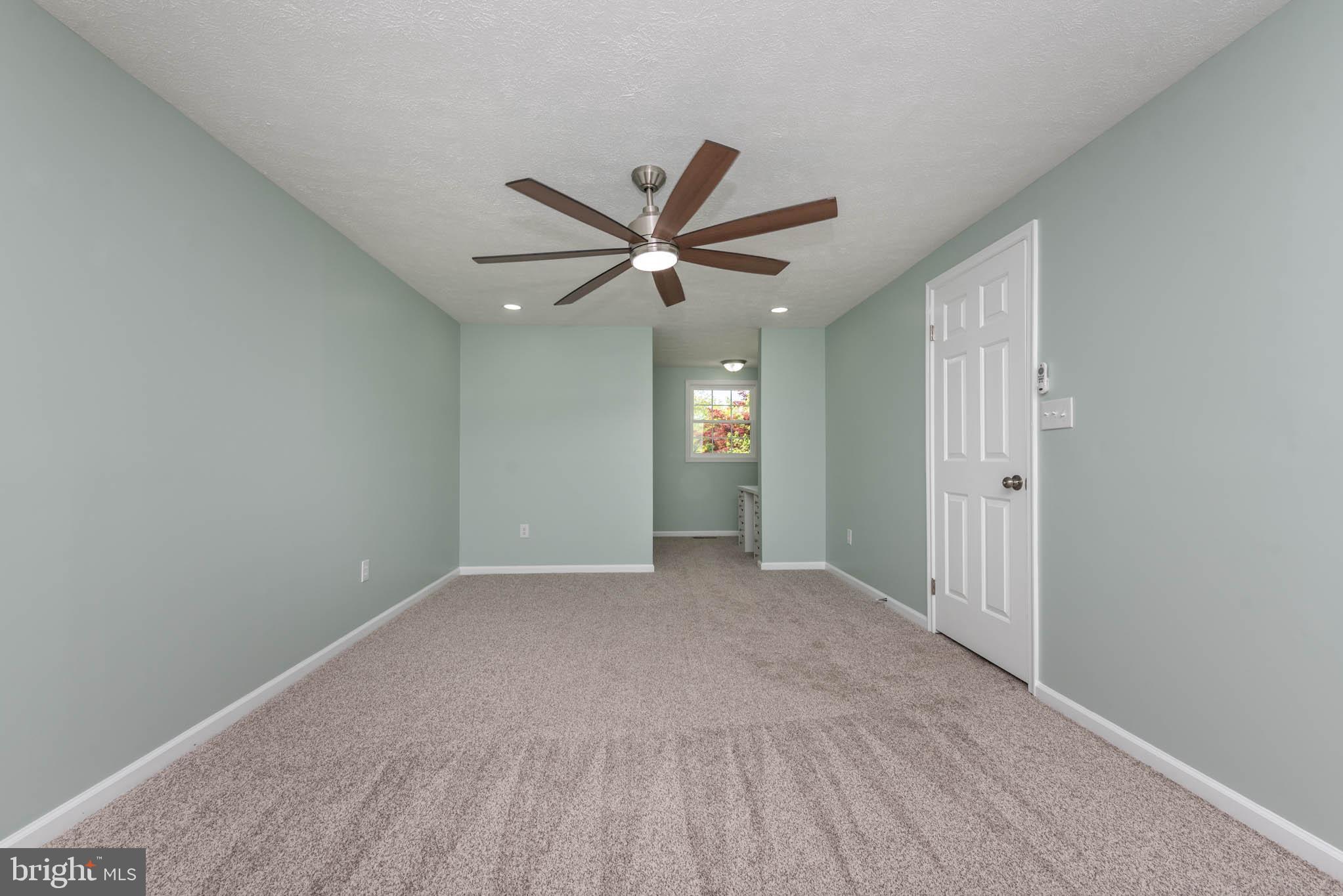 7674 Tuckerman Drive Hanover, MD 21076 - Photo 16 of 45 wooden floor in an empty room