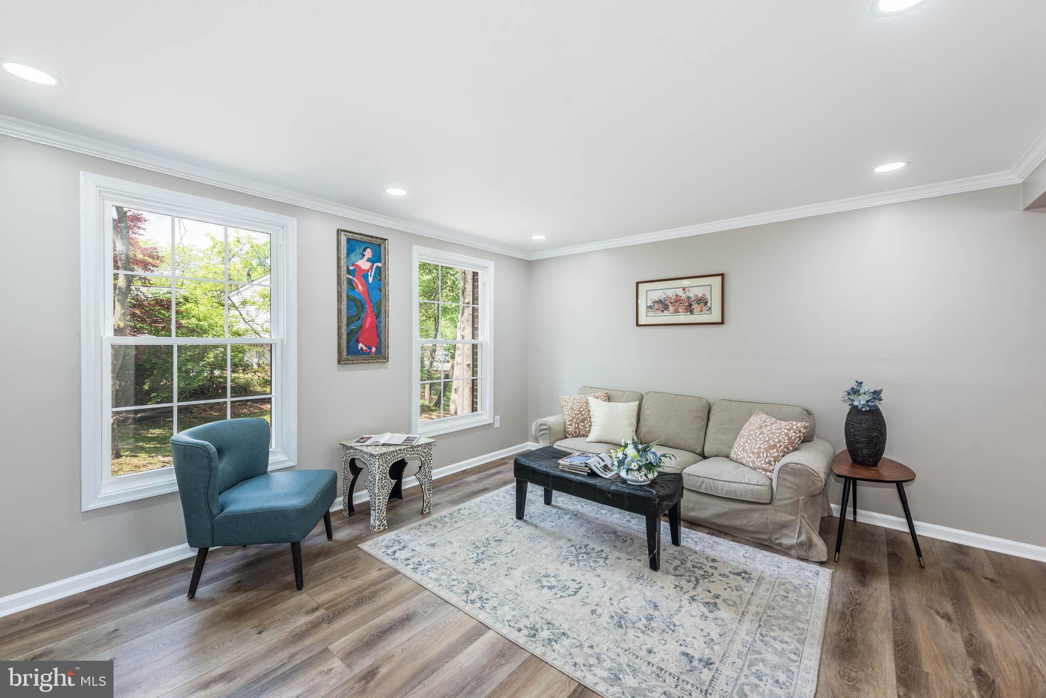 7674 Tuckerman Drive Hanover, MD 21076 - Photo 2 of 45 a living room with furniture and a window
