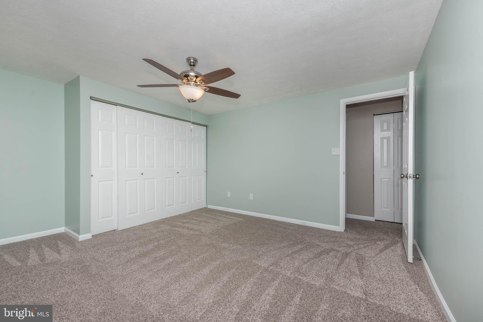 7674 Tuckerman Drive Hanover, MD 21076 - Photo 23 of 45 a view of an empty room