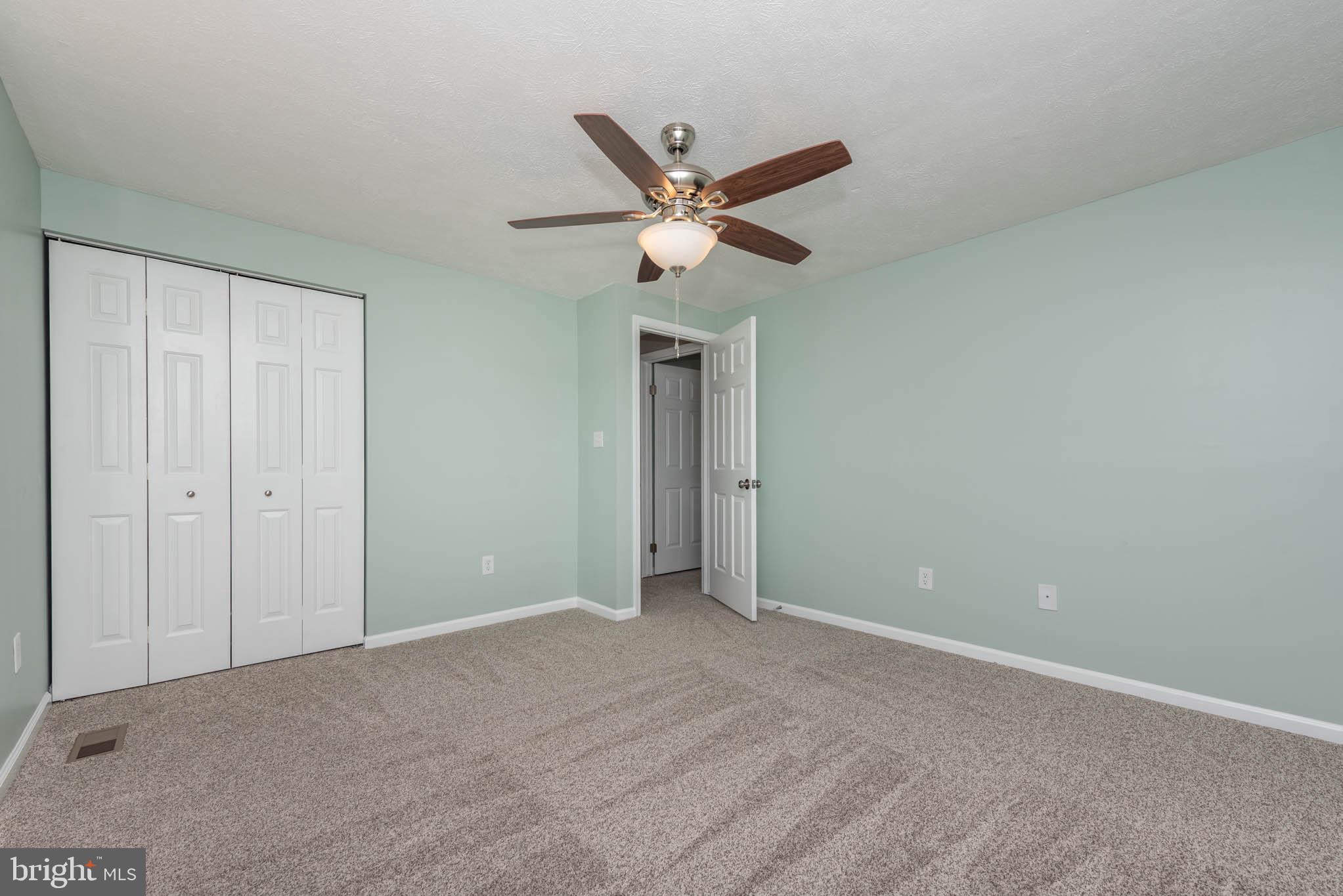 7674 Tuckerman Drive Hanover, MD 21076 - Photo 26 of 45 a view of an empty room