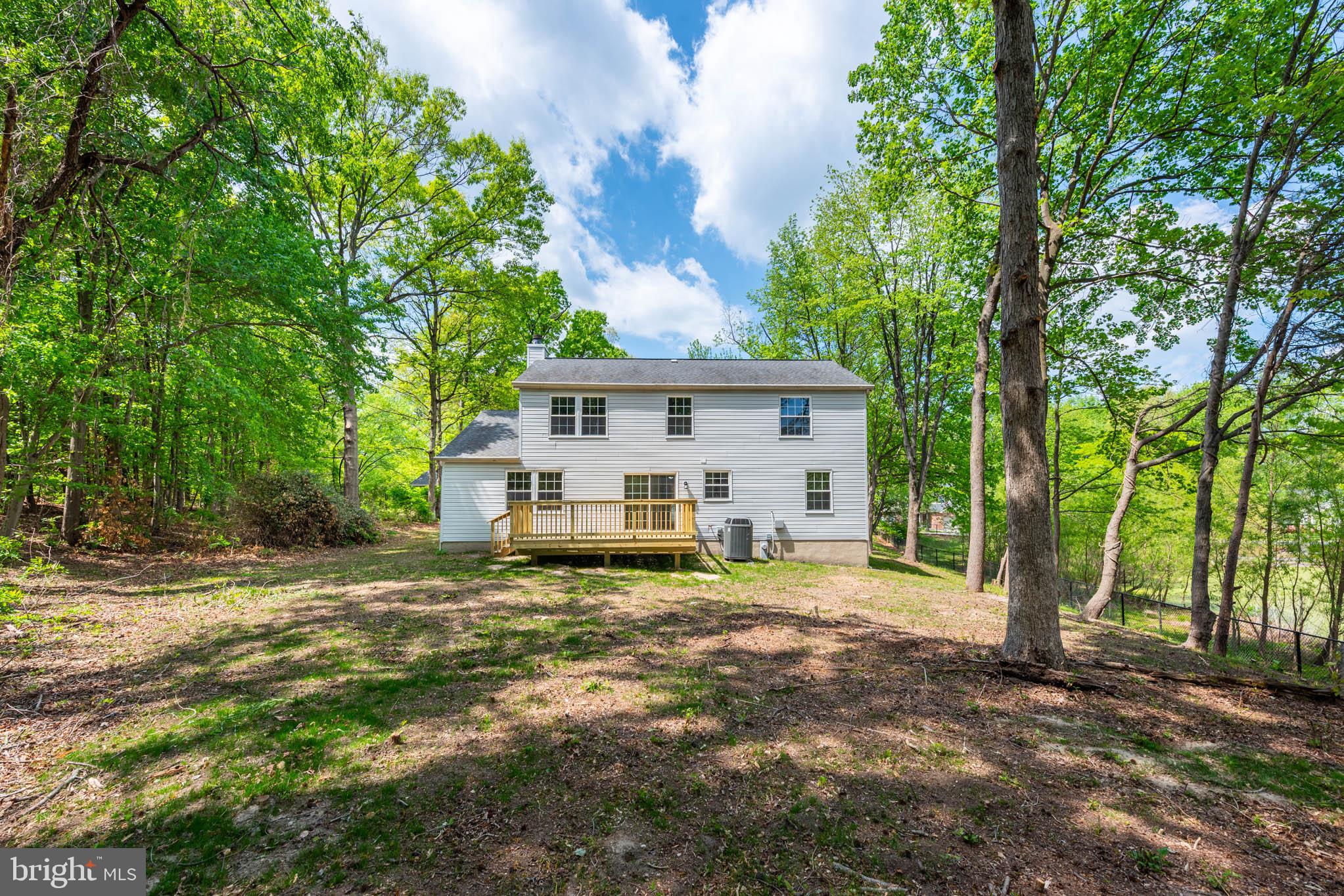 7674 Tuckerman Drive Hanover, MD 21076 - Photo 38 of 45 a view of a house with a patio