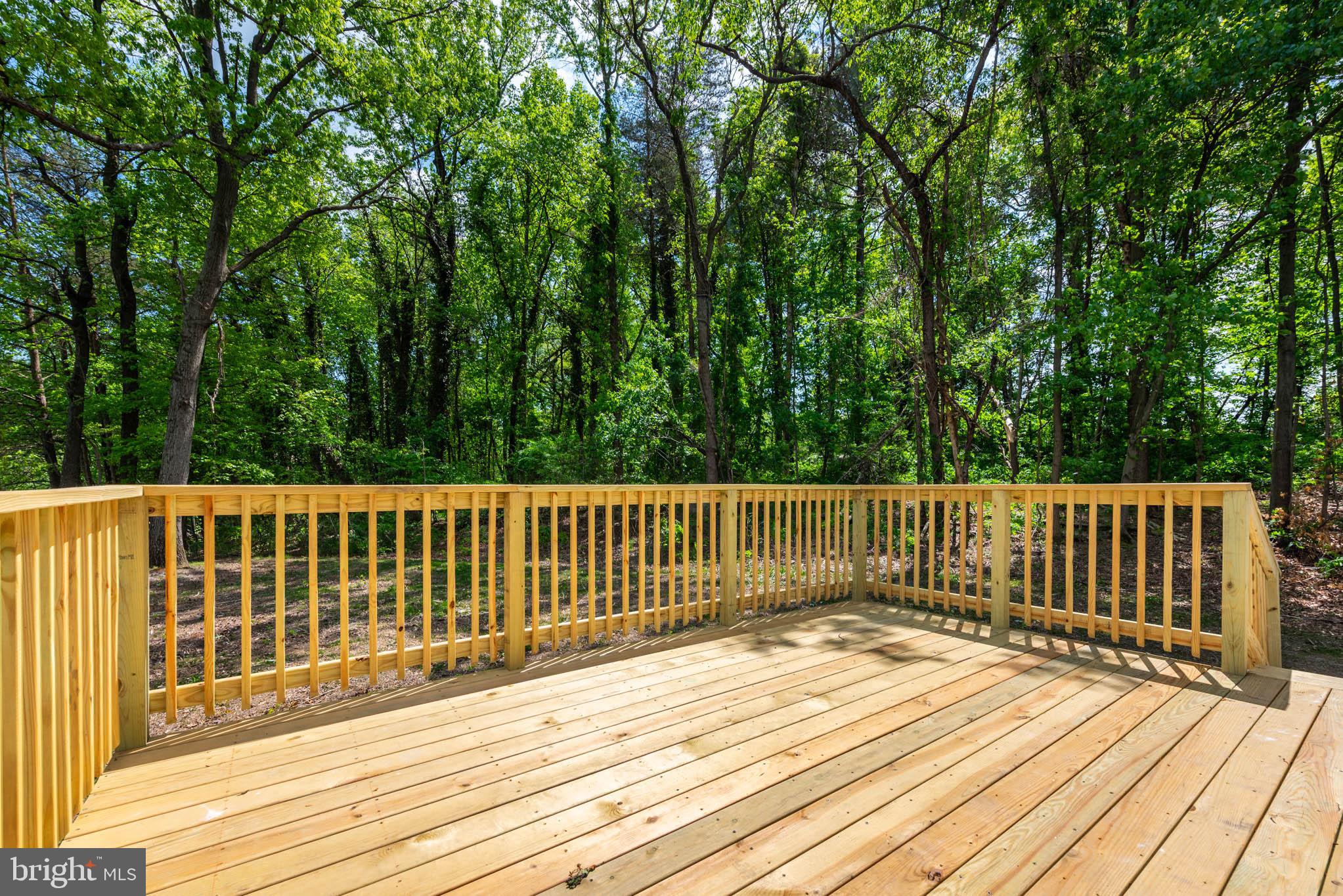 7674 Tuckerman Drive Hanover, MD 21076 - Photo 40 of 45 a view of a wooden deck