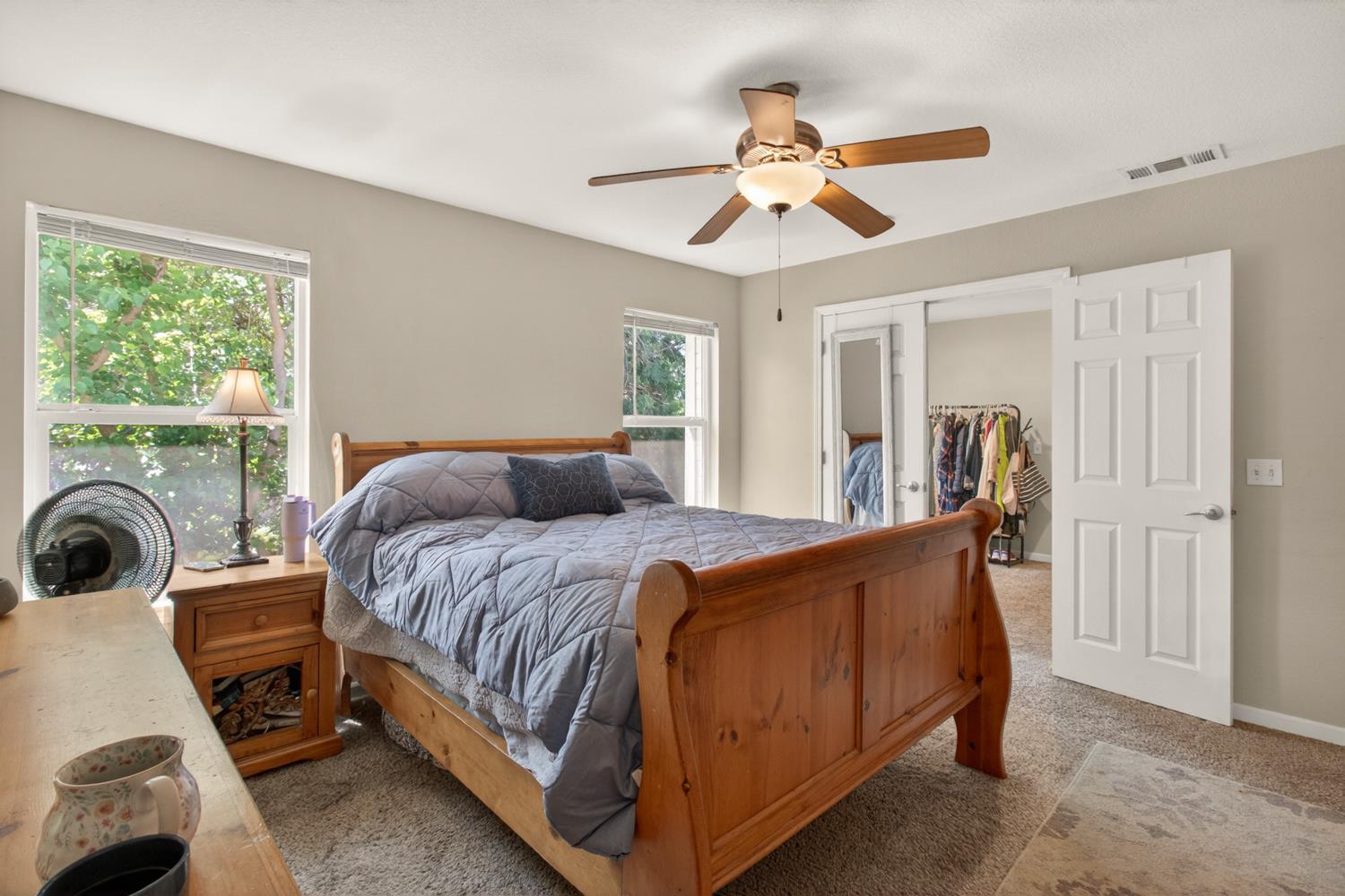 6332 Horseshoe Bar Road Loomis, CA 95650 - Photo 35 of 85 Carpeted sleeping area featuring neutral wall tones and a ceiling fan with integrated lighting