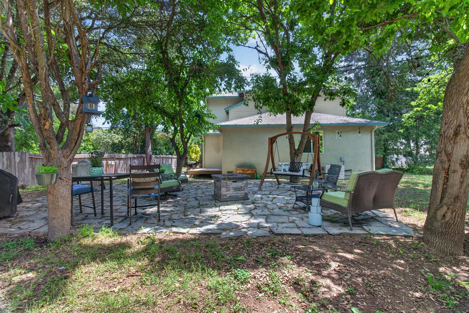 6332 Horseshoe Bar Road Loomis, CA 95650 - Photo 62 of 85 Stone patio surrounded by mature trees