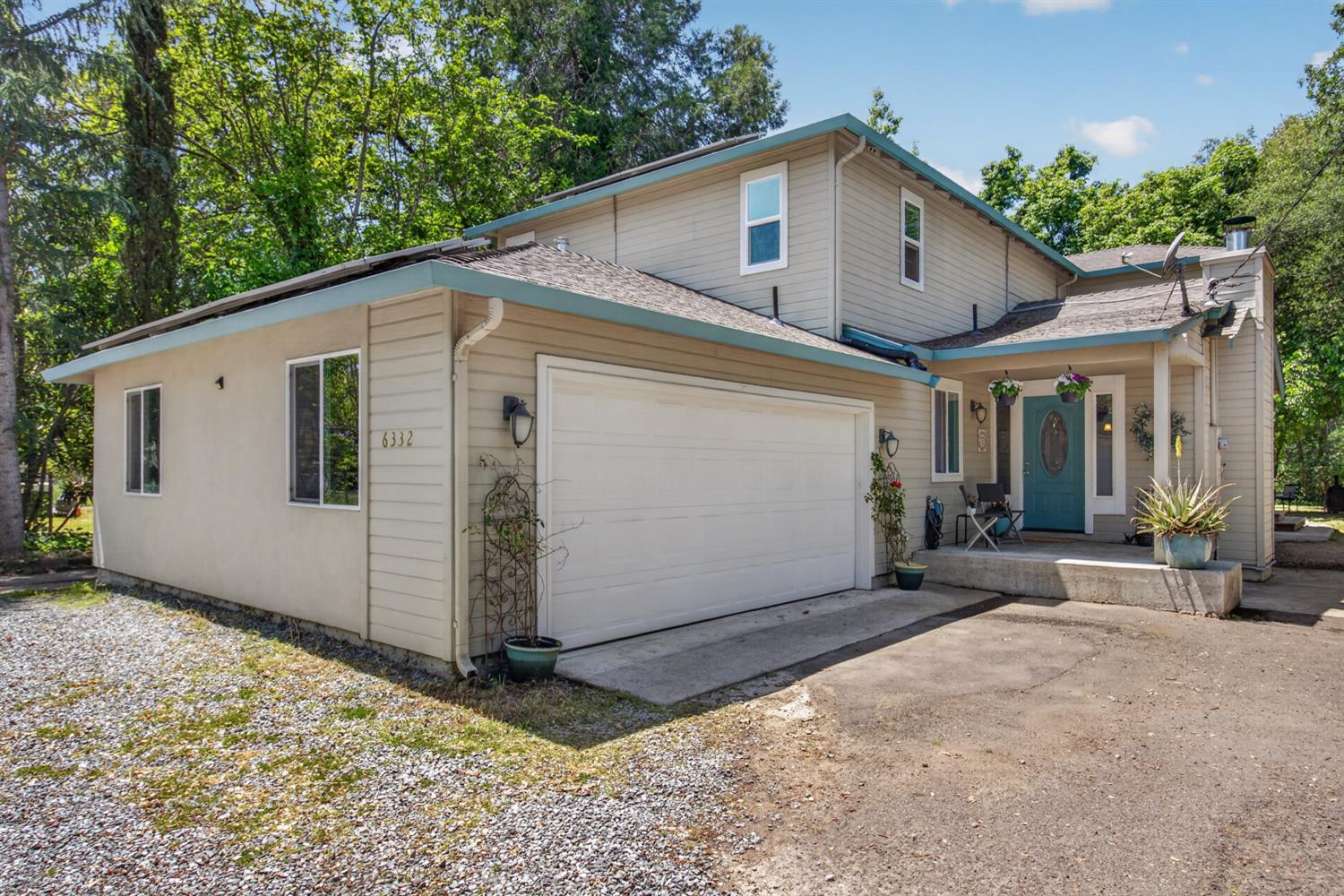 6332 Horseshoe Bar Road Loomis, CA 95650 - Photo 67 of 85 Two-story residence featuring a covered front entry, attached garage, multiple windows, and exterior siding