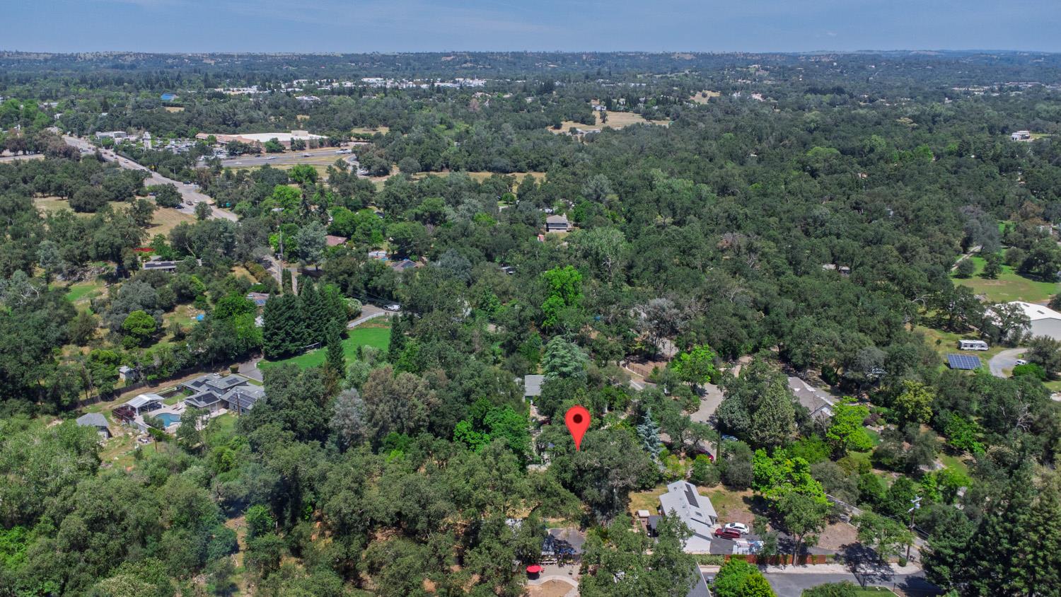 6332 Horseshoe Bar Road Loomis, CA 95650 - Photo 78 of 85 Expansive aerial perspective showcasing a property surrounded by mature trees